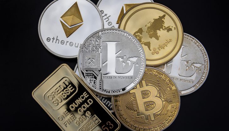 procura por Ouro e Bitcoin