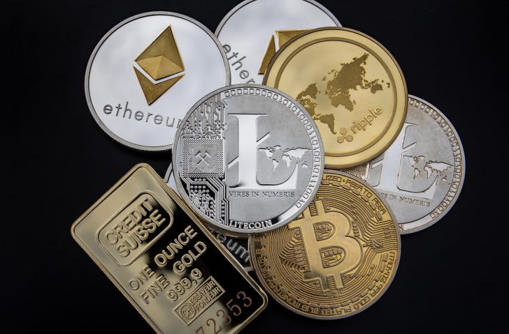 procura por Ouro e Bitcoin