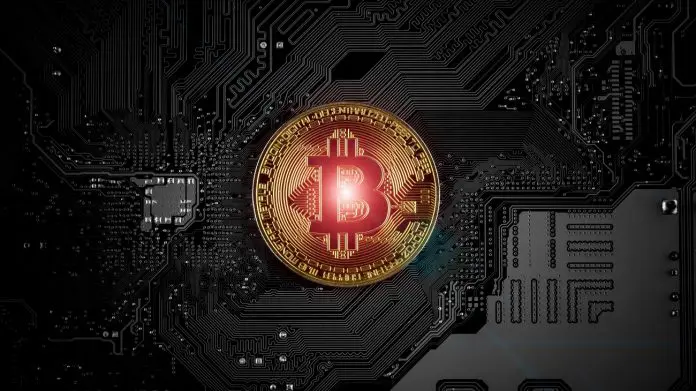 Moeda digital Bitcoin com luz vermelha