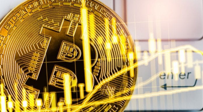 Gráfico do Bitcoin e moeda em destaque