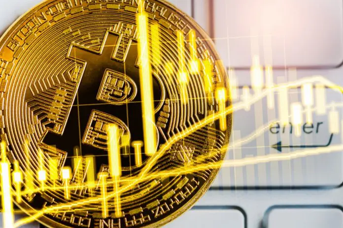 Gráfico do Bitcoin e moeda em destaque