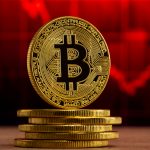 Moeda Bitcoin em frente a um gráfico vermelho