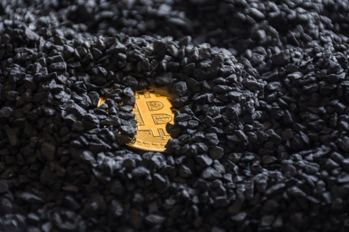 Moeda Bitcoin enterrada