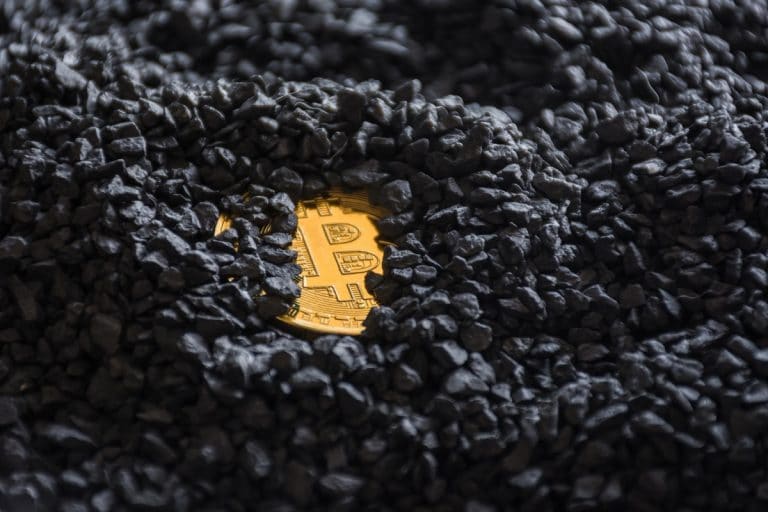 Moeda Bitcoin enterrada