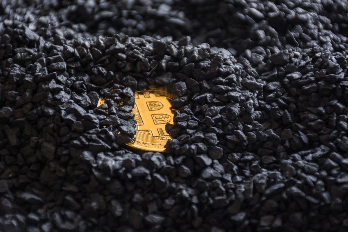 Moeda Bitcoin enterrada