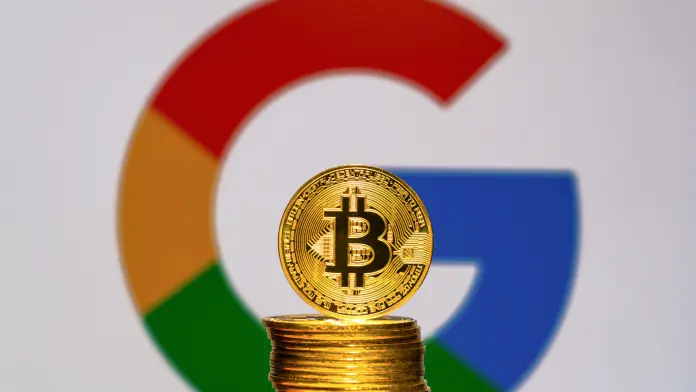 Bitcoin com logomarca do Google ao fundo. (Pixabay)