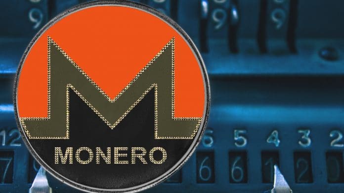 Criptomoeda Monero e códigos ao fundo