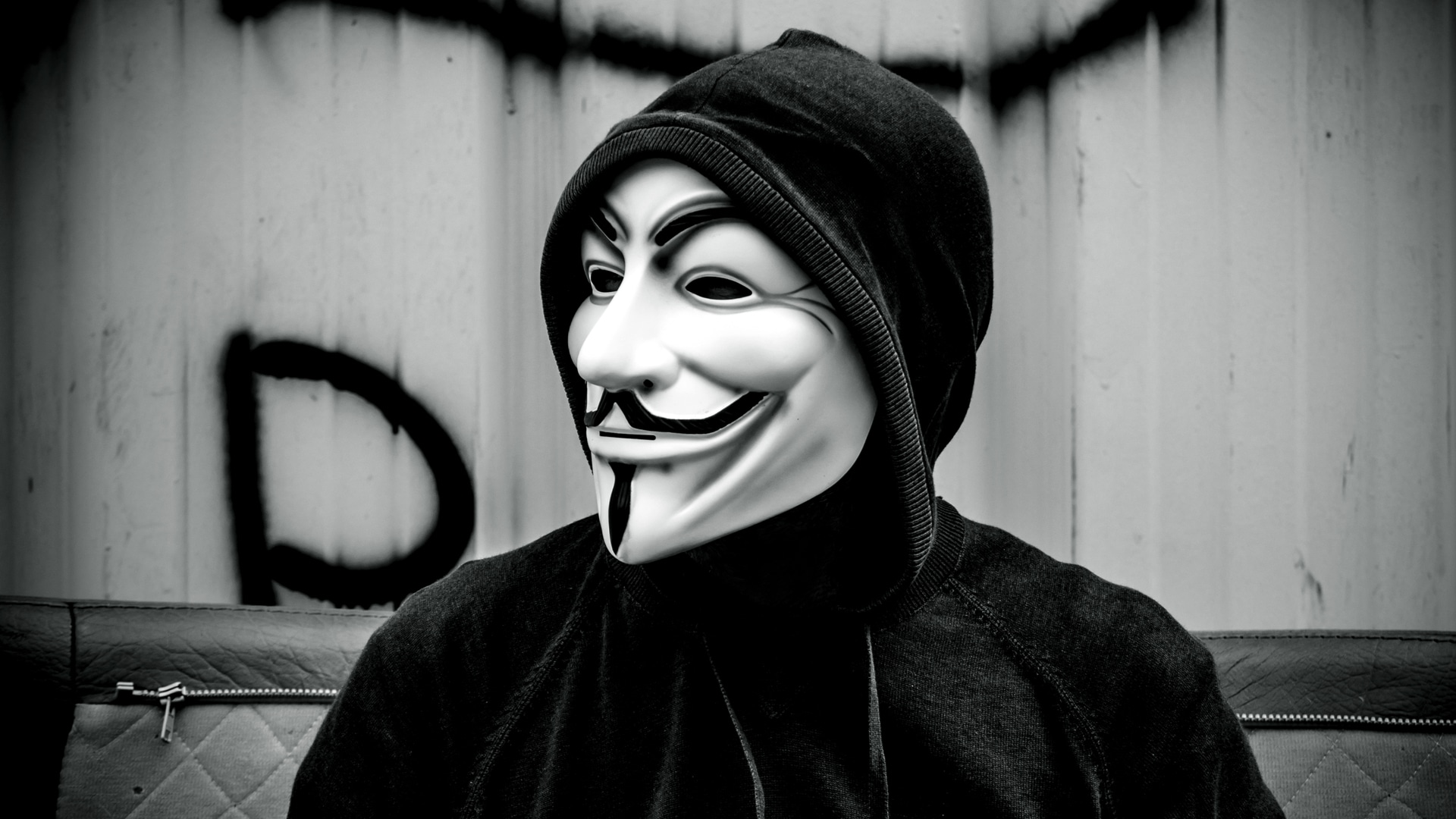 Pessoa com máscara do Anonymous