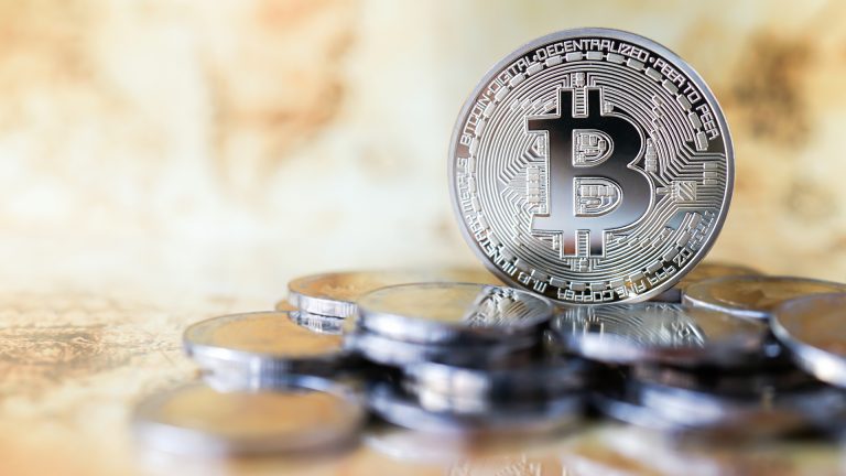Bitcoin e moedas de prata