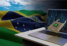Computador bloqueado e bandeira do Brasil ransomwares