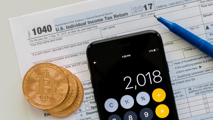 Ficha e calculadora para trader de Bitcoin pagar impostos
