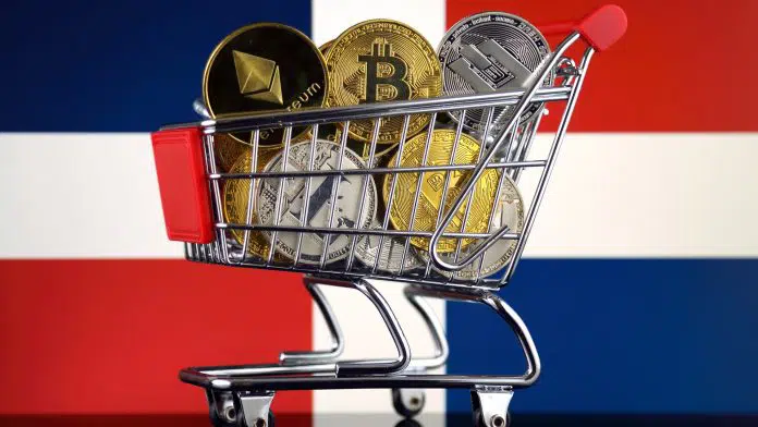 Carrinho de compras com Bitcoin e outras criptomoedas em frente a bandeira da República Dominicana