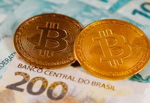 Bitcoin e notas de Real brasileiro