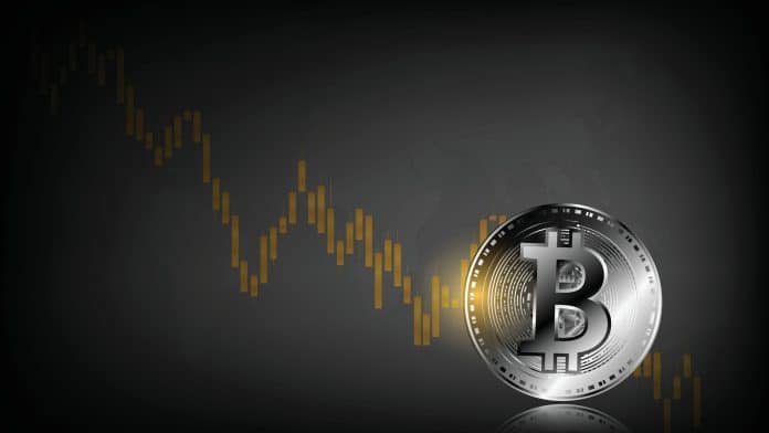 Moeda digital em gráfico de preço operando em queda