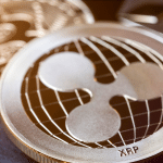 Símbolo da XRP, criptomoeda emitida pela Ripple