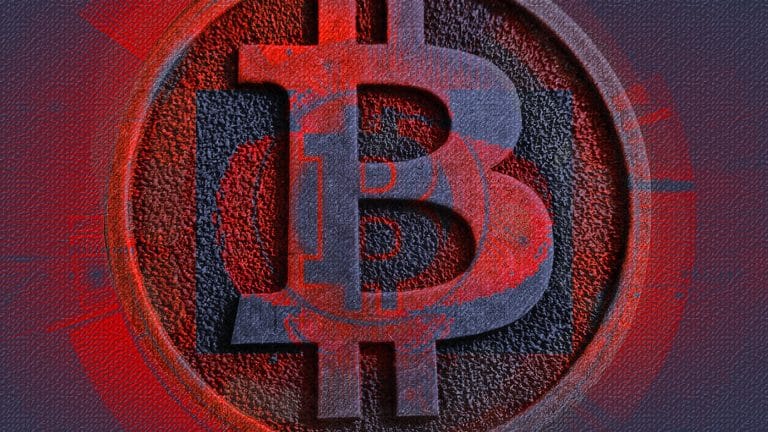 Emblema do Bitcoin de vermelho, sinal de queda no mercado