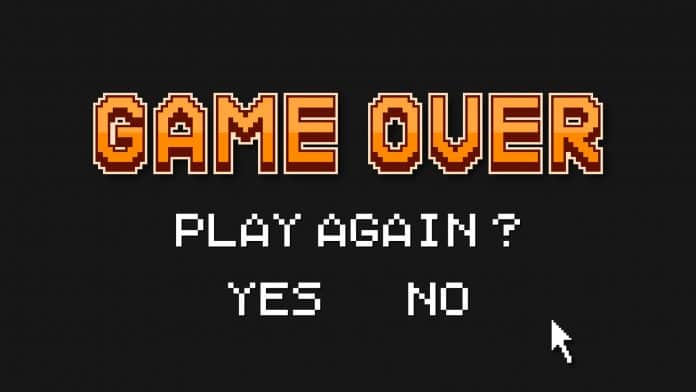 Game Over em jogo, mensagem pergunta se gamer quer jogar novamente, Sim ou Não