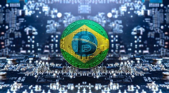 Bandeira do Brasil em bitcoin em meio a placas de mineração