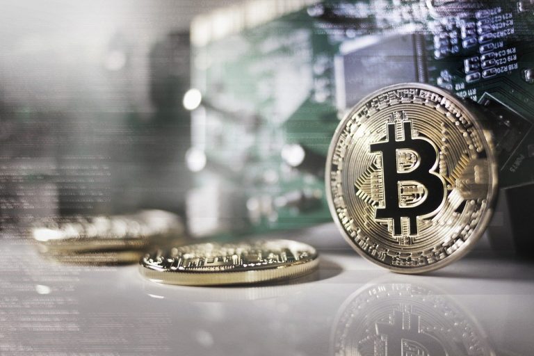 Moeda Bitcoin com fundo