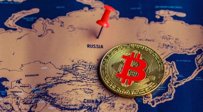 Mapa da Rússia e moeda de Bitcoin