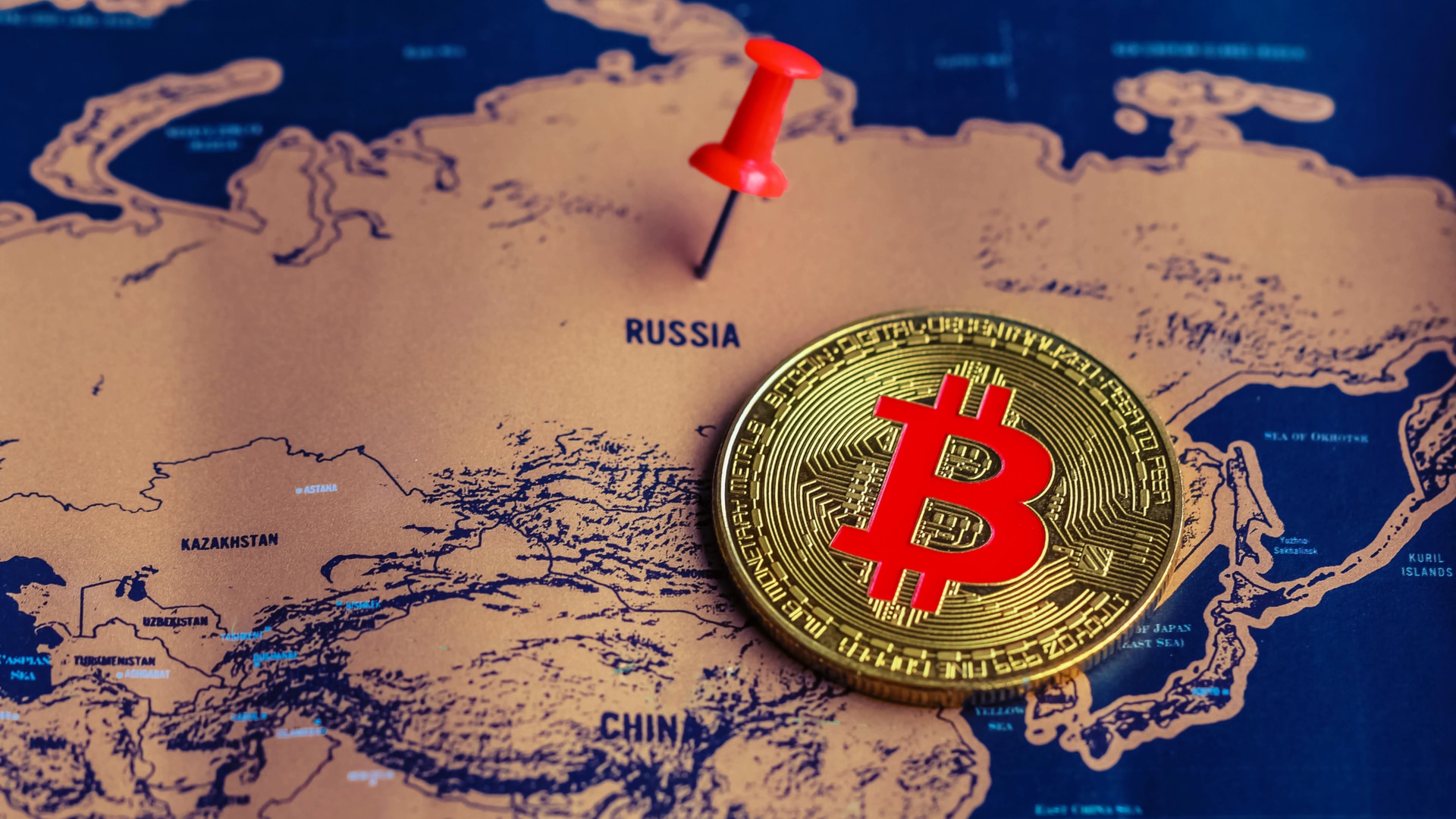 Mapa da Rússia e moeda de Bitcoin