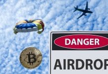 Placa de perigo ao lado de airdrop de Bitcoin e criptomoedas