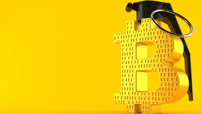 Símbolo do Bitcoin como uma granada de mão.