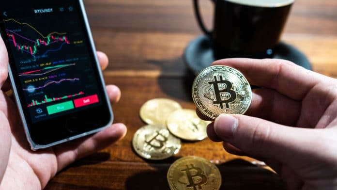 Preço do Bitcoin na tela do celular.