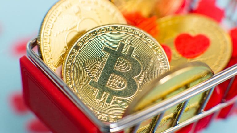 Bitcoin em carrinho de compra com imagem de coração, romance