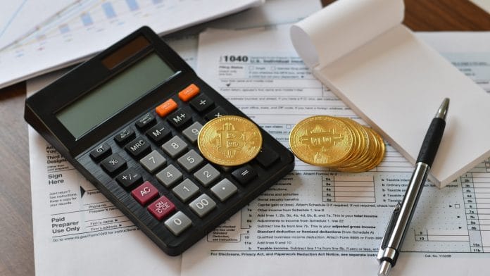 Calculadora e criptomoedas, em tributação e Receita Federal