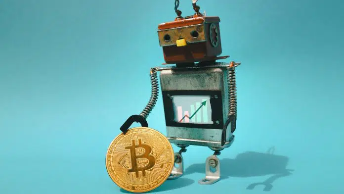 Robô segurando Bitcoin