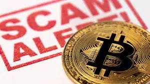 Alerta de scam com imagem do Bitcoin e criptomoedas