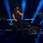 Elon Musk rindo durante evento da Tesla
