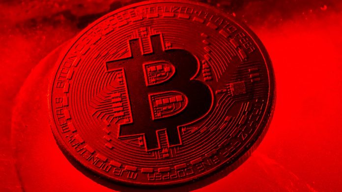 Moeda Bitcoin em gelo vermelho