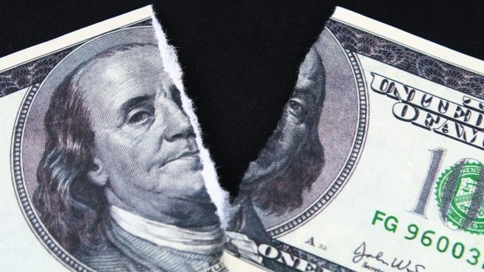 Nota de Dólar rasgada