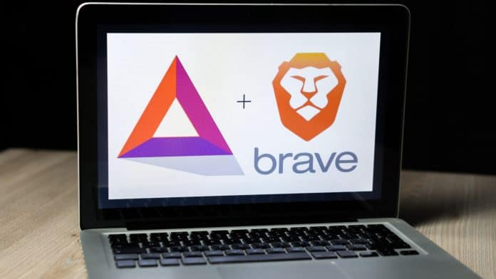 Token BAT ao lado do navegador Brave em computador