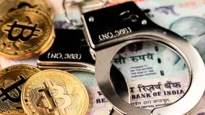 Moedas de bitcoin ao lado de algemas.