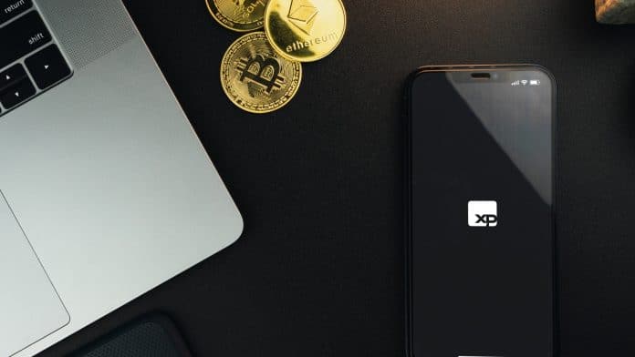 Aplicativo da XP Investimentos próximo do Bitcoin e Ethereum, criptomoedas