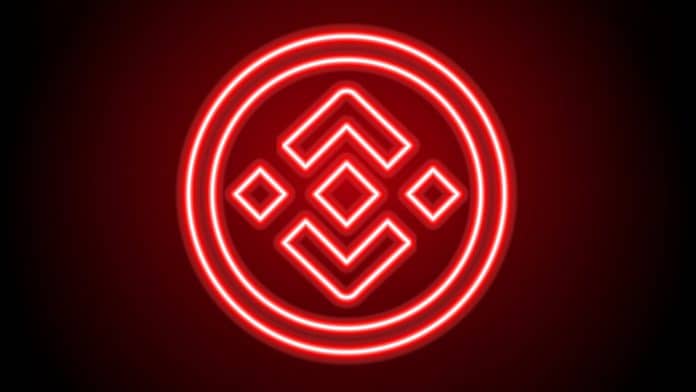 Símbolo da criptomoeda BNB em tom vermelho