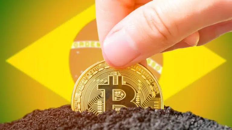 Bitcoin sendo plantado em terra com bandeira do Brasil ao fundo e blockchain
