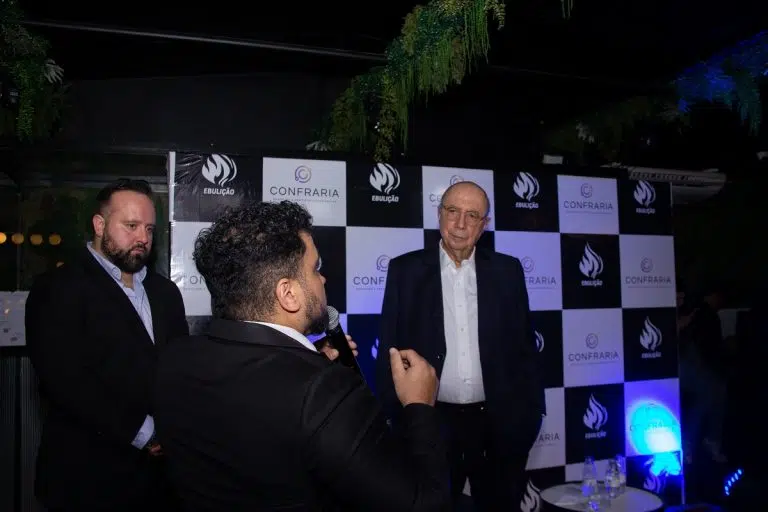 Henrique Meirelles em conversa com empresários durante evento