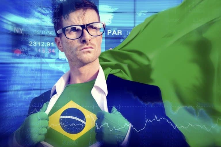 Homem com bandeira do Brasil como super herói criptomoedas Bitcoin