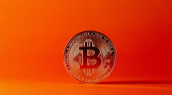 Bitcoin com fundo laranja comprando e vendendo