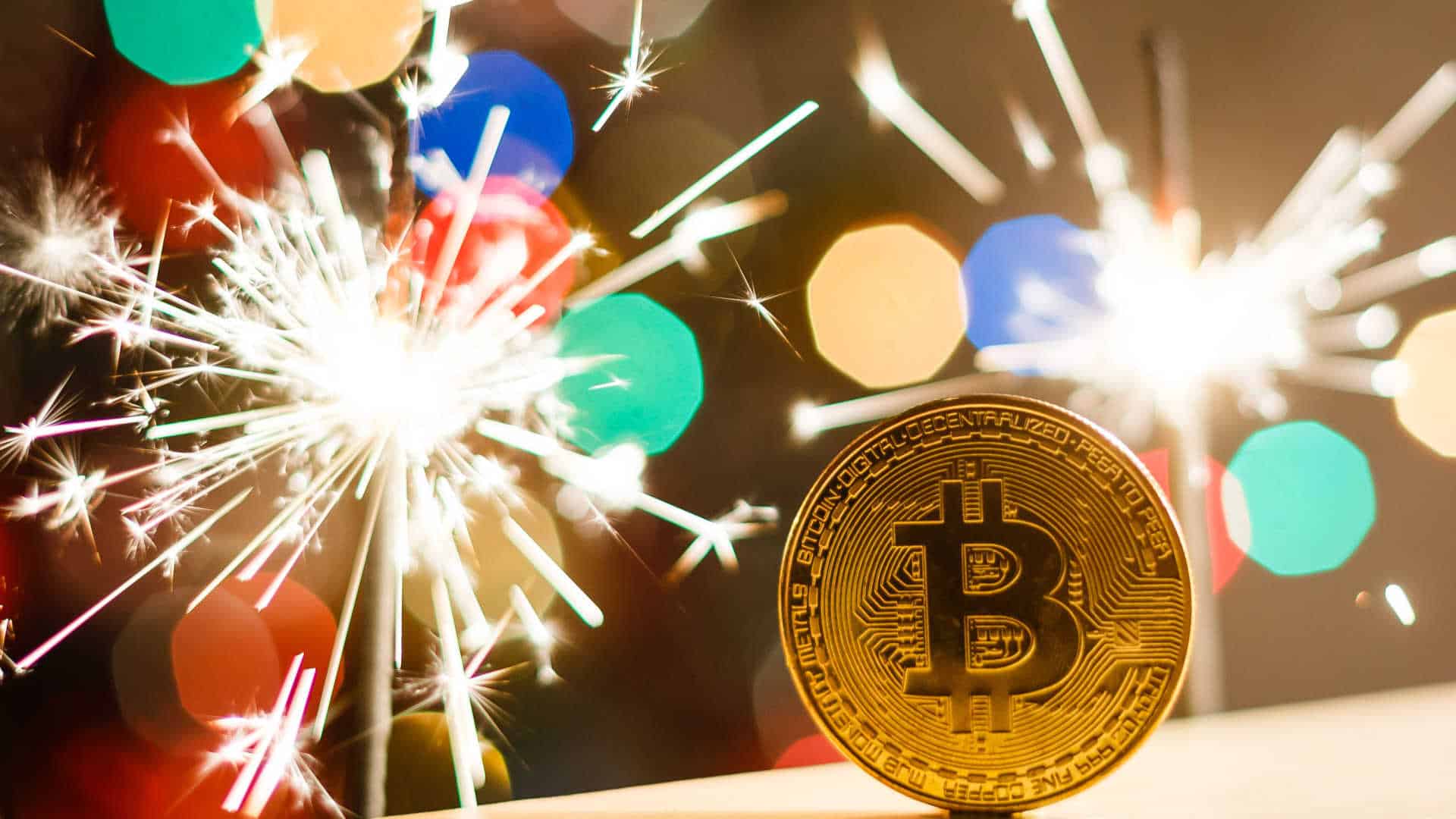 Bitcoin e vela de aniversário.
