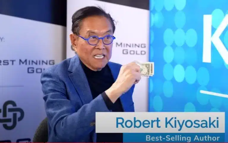 Robert Kiyosaki segura nota de um dólar