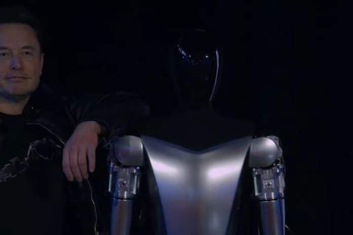 Elon Musk apoiado em robô
