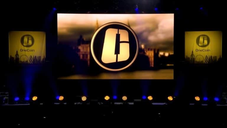Evento da pirâmide OneCoin. Reprodução.