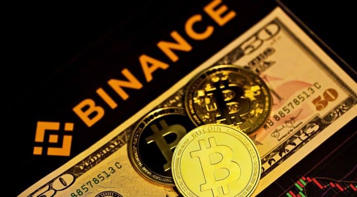 Gráficos da Binance, do Dólar e moedas simbólicas de bitcoin