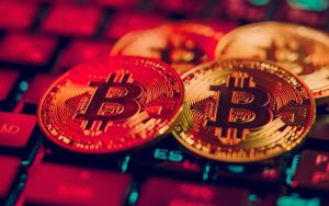 Bitcoins sobre luz vermelha, representando queda. Fonte: MidJourney.