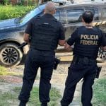 Agentes da PF em cumprimento de mandado contra crimes de tráfico de mulheres praticado do Brasil para outros países